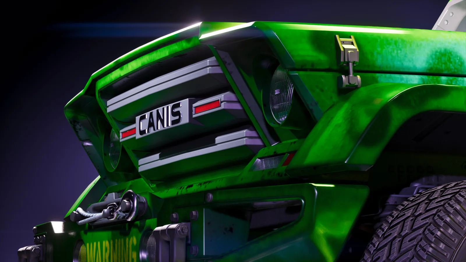 Close-up of the bright green off-road truck's front end lit against a dark backdrop, its slatted grille carrying a chrome CANIS badge beside round headlights and a winch bumper.