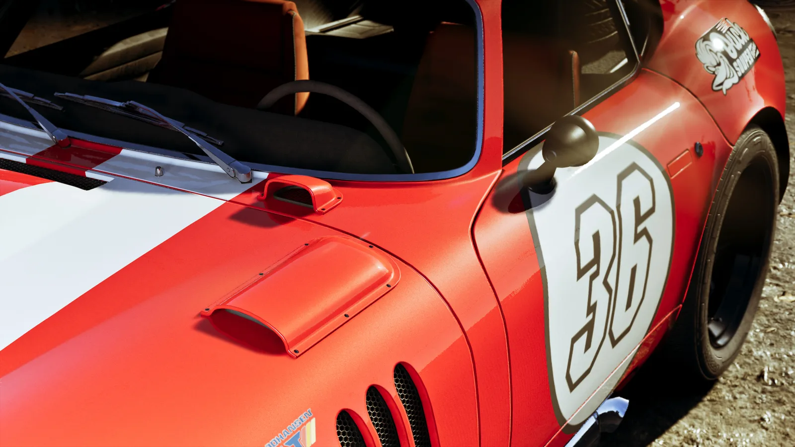 Close-up of a red and white racing coupe with the number 36 on a white roundel on its door, bonnet vents along the wing and a cartoon character decal on the rear quarter.