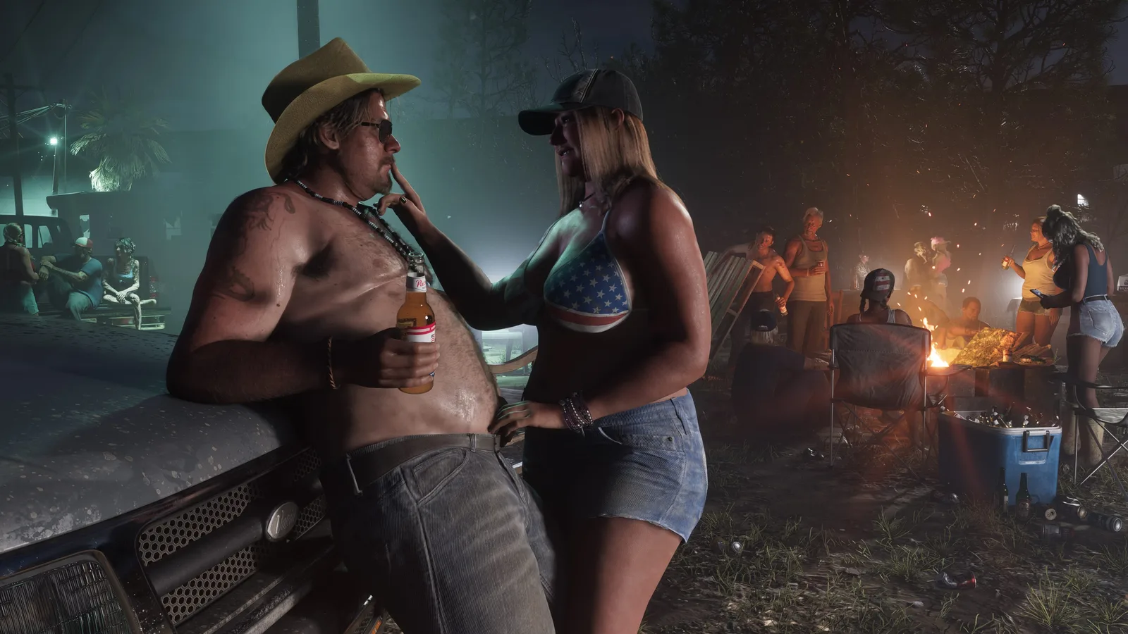 A night party in a wooded lot — a shirtless man in a straw cowboy hat leaning on a car bonnet with a beer while a woman in a flag-print bikini top talks to him, a bonfire and drinkers behind.