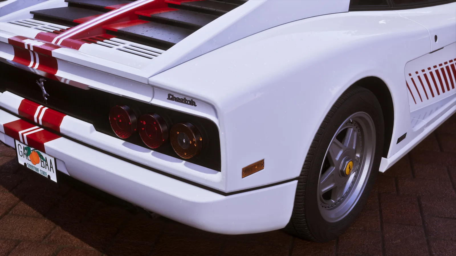 Rear quarter detail of the white Grotti Cheetah on brick paving — slatted engine cover, round tail lights, a Cheetah script badge and a Goodtime State licence plate.
