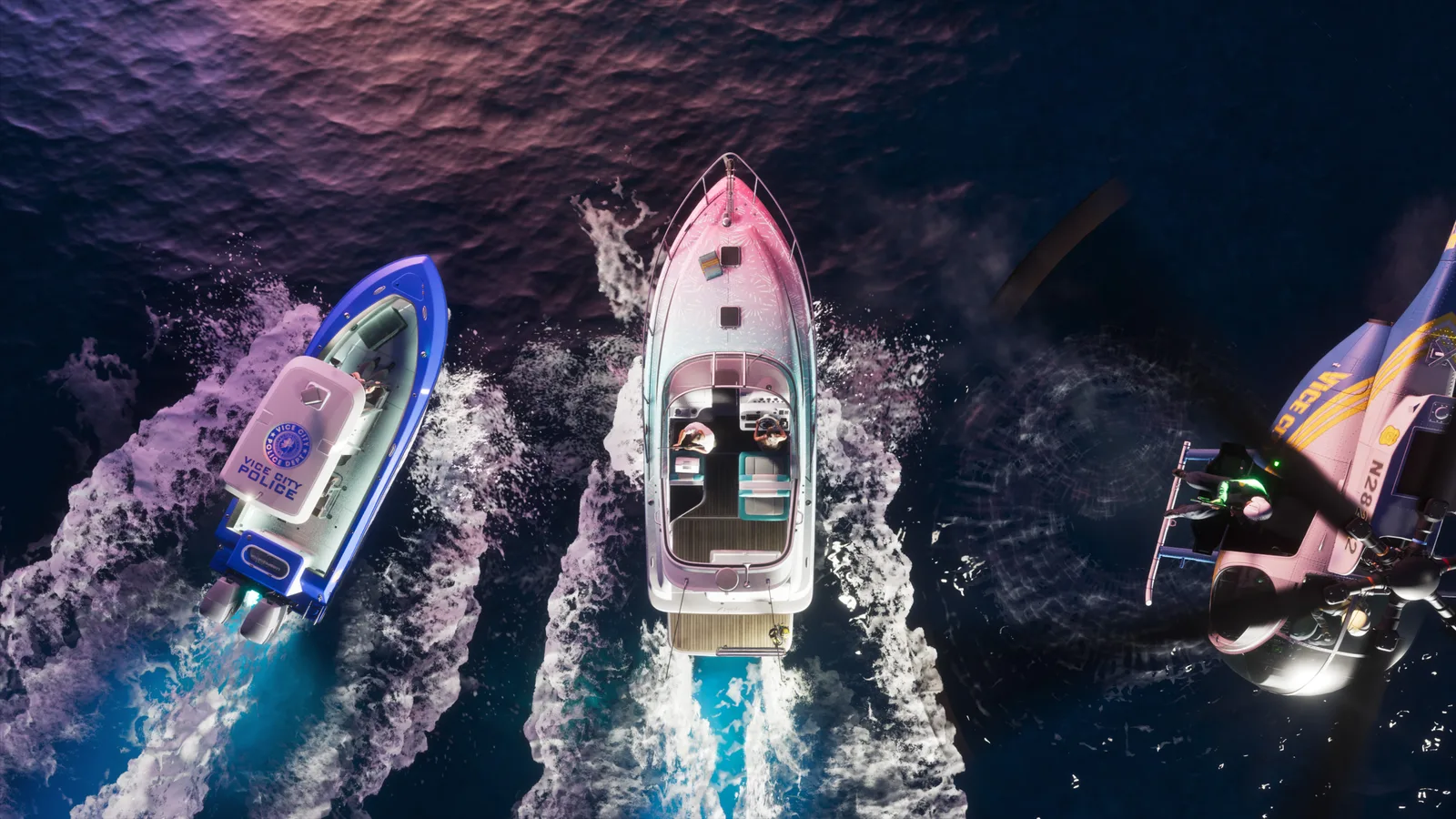 Overhead night view of a pink and white speedboat running at speed, a blue Vice City Police boat closing on its left and a pink Vice City helicopter low over the water on its right.
