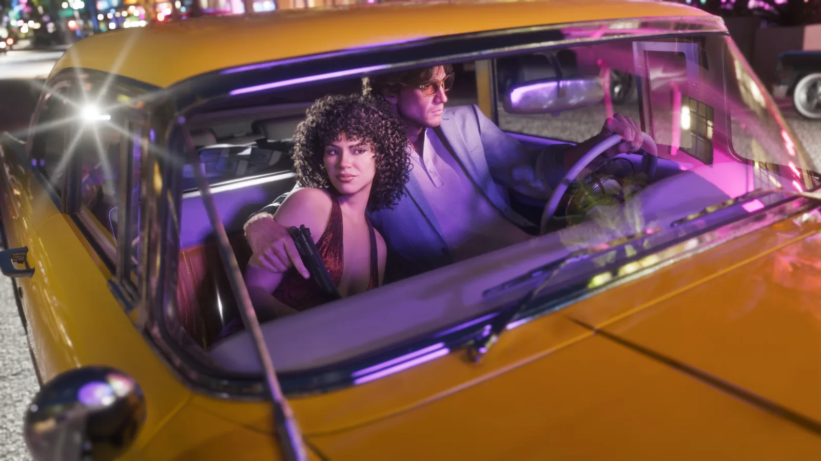 A man in a pale suit and tinted glasses at the wheel of the yellow Stanier at night, a woman in a red sequinned dress in the passenger seat holding a submachine gun, neon storefronts blurred behind.
