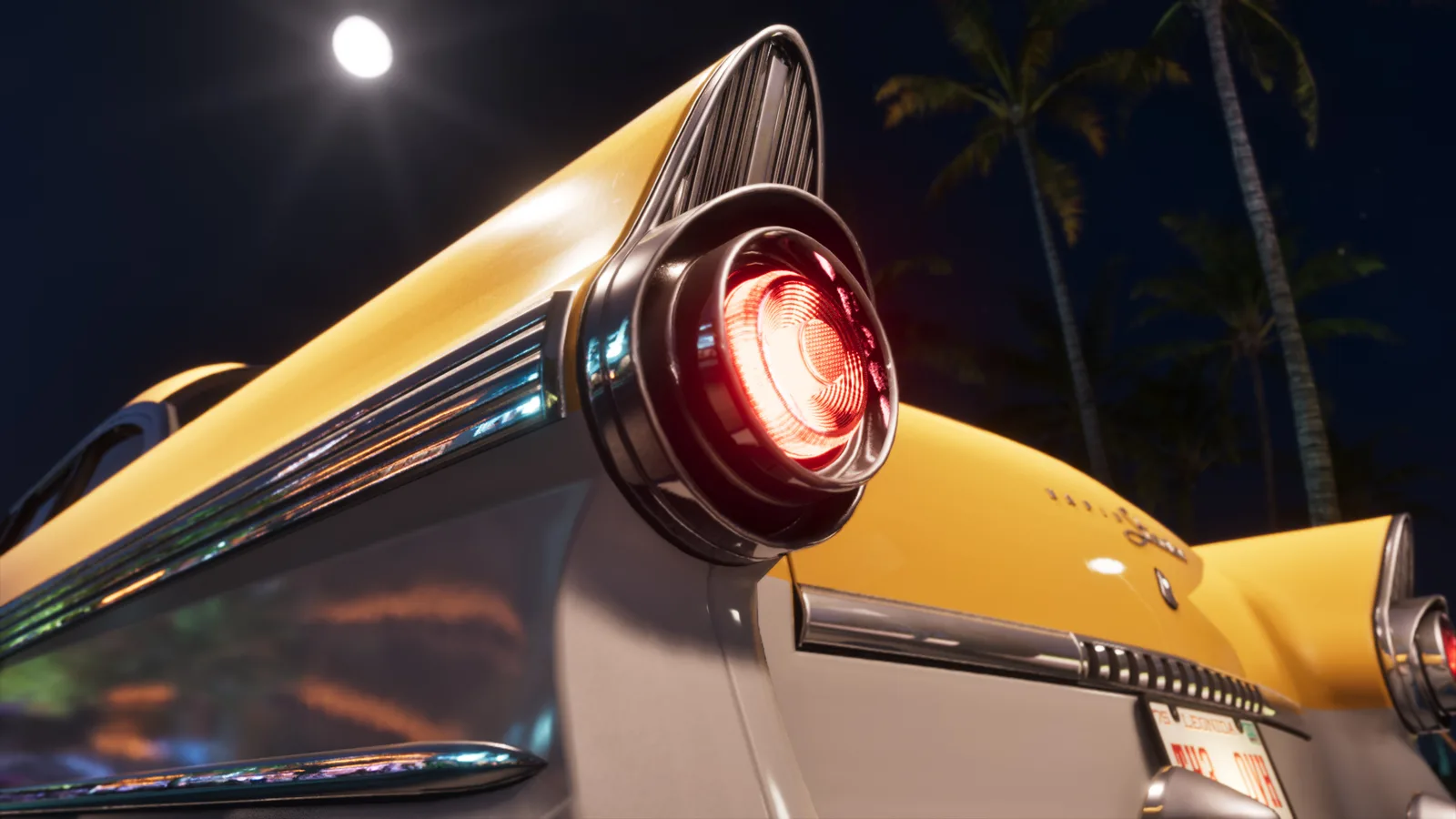 Night close-up of the Stanier's tail fin and chrome-hooded round tail light lit red, palms and a full moon behind and a Leonida licence plate below.